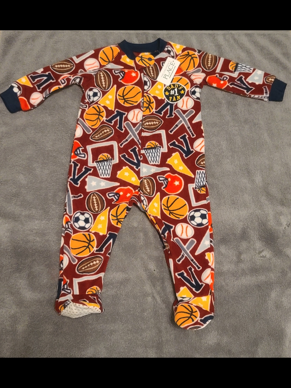 NEW 9-12m The Children's Place Sports Print One-Piece Footie Pajamas
